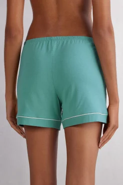 Shorts i modal med kontrasterande passpoal