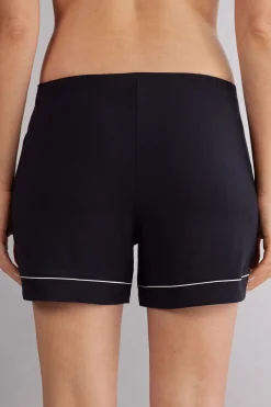 Shorts i modal med kontrasterande passpoal